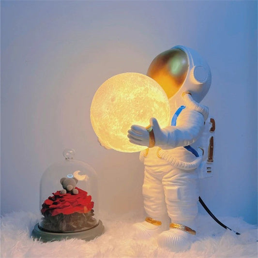 Lampe de chevet astronaute avec lune lumineuse