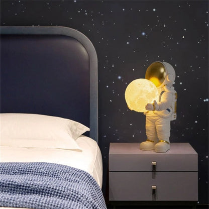 Lampe de chevet astronaute avec lune lumineuse