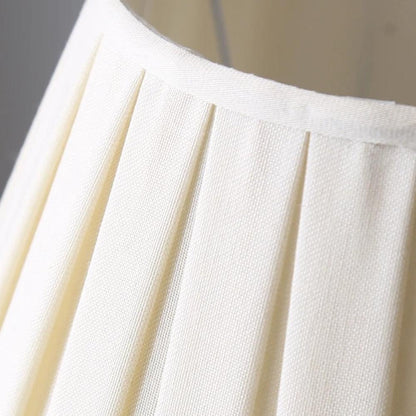 Lampe de chevet céramique blanche et dorée avec abat-jour plissé