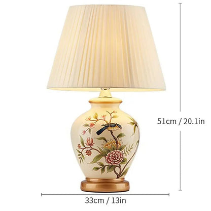 Lampe de chevet céramique à motifs floraux et oiseau