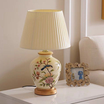 Lampe de chevet céramique à motifs floraux et oiseau